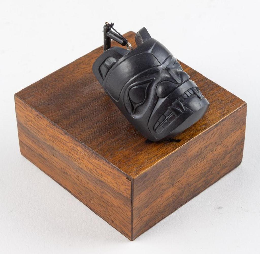 Ron Russ - a carved argillite pendant depicting Bear