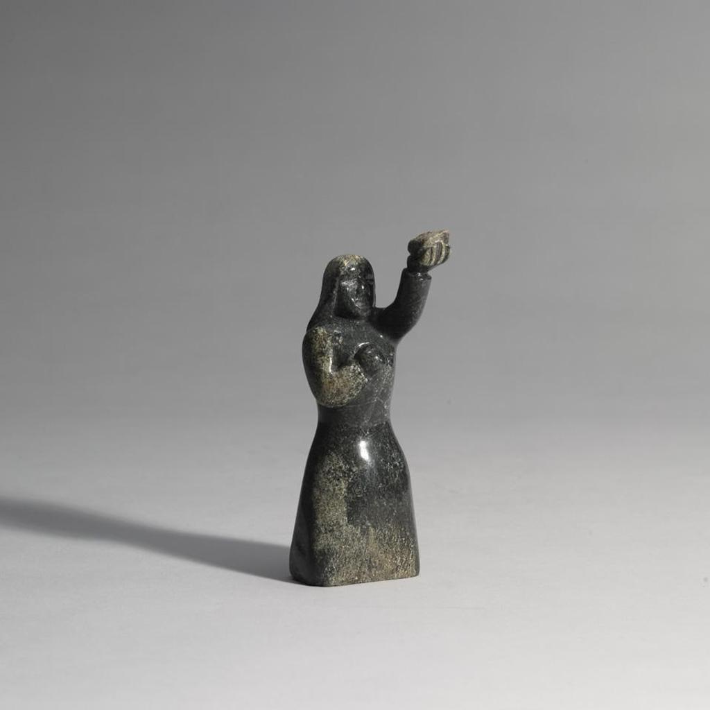 Oviloo Tunnillie (1949-2014) - Woman With Stone Offering