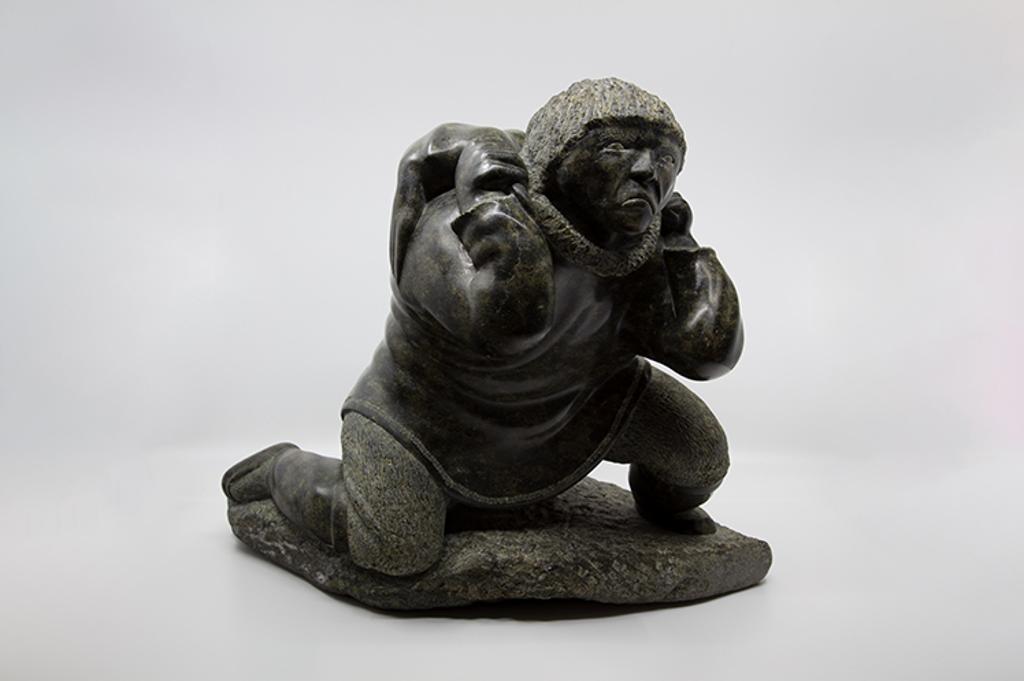 Lucassie Ikkidluak (1949) - Kneeling Man Carrying Seal