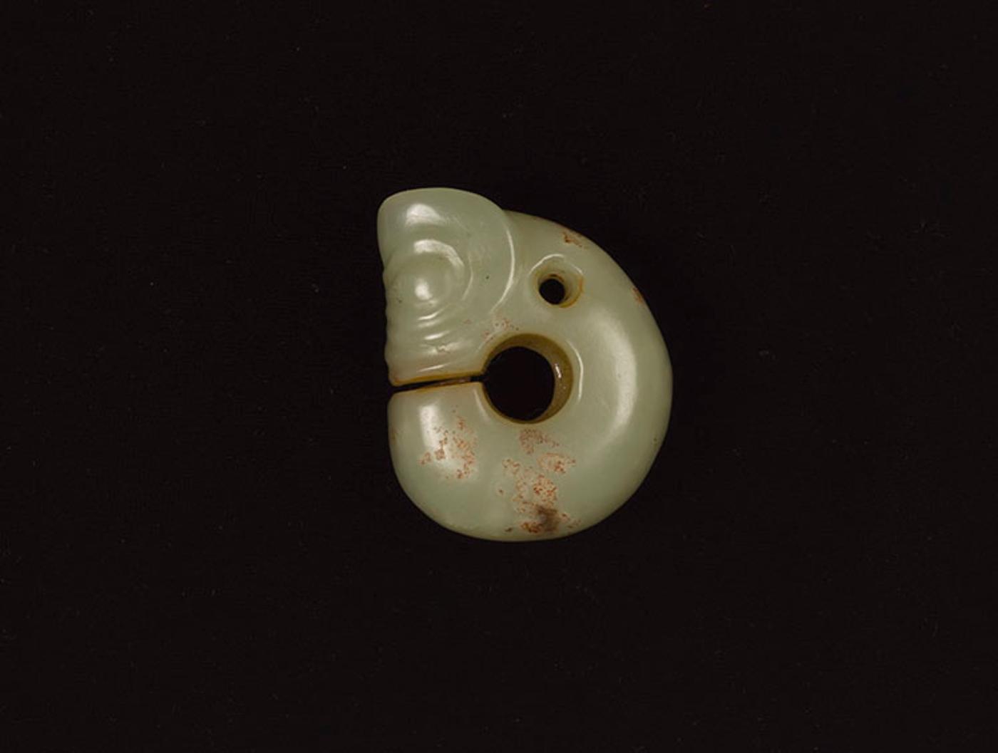 Chinese Art - A Chinese Celadon Jade Carved 'Pig Dragon' Pendant, Neolithic Period, Hongshan Culture