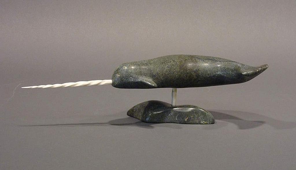 Kringayark - Repulse Bay a soapstone carving of a narwhal with bone tusk