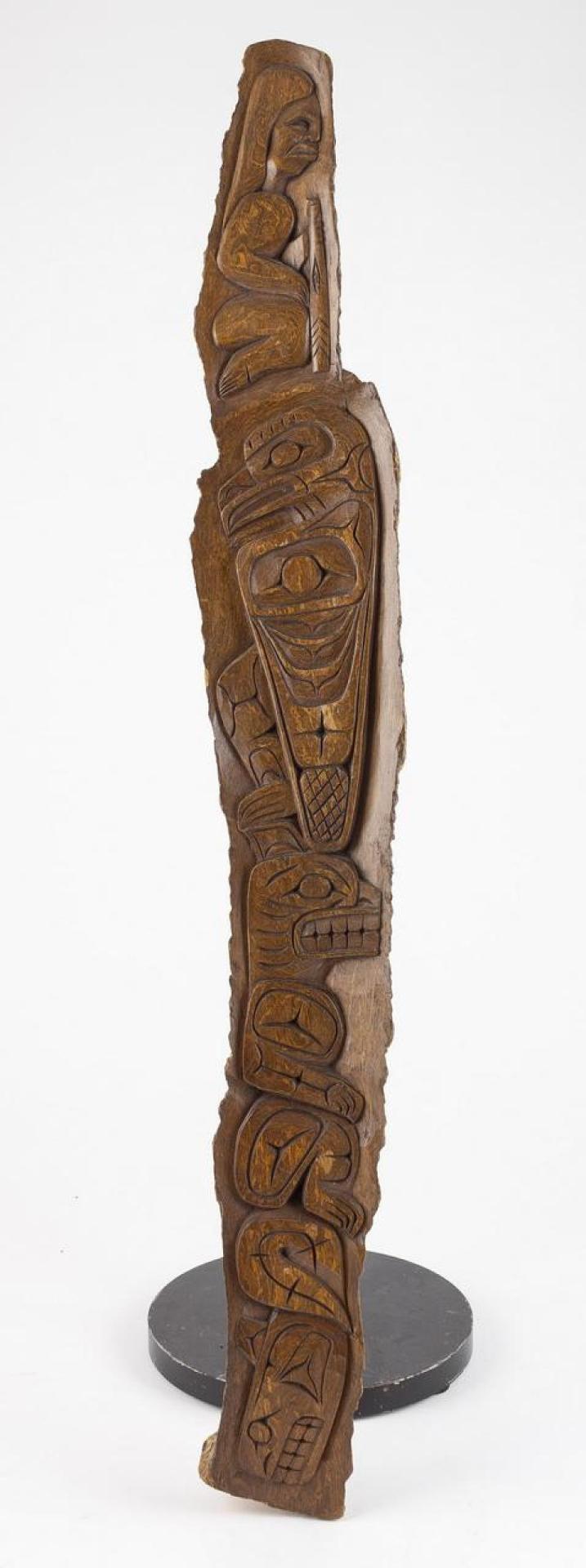 Larry Joseph (1942-2002) - a carved cedar panel depicting Man