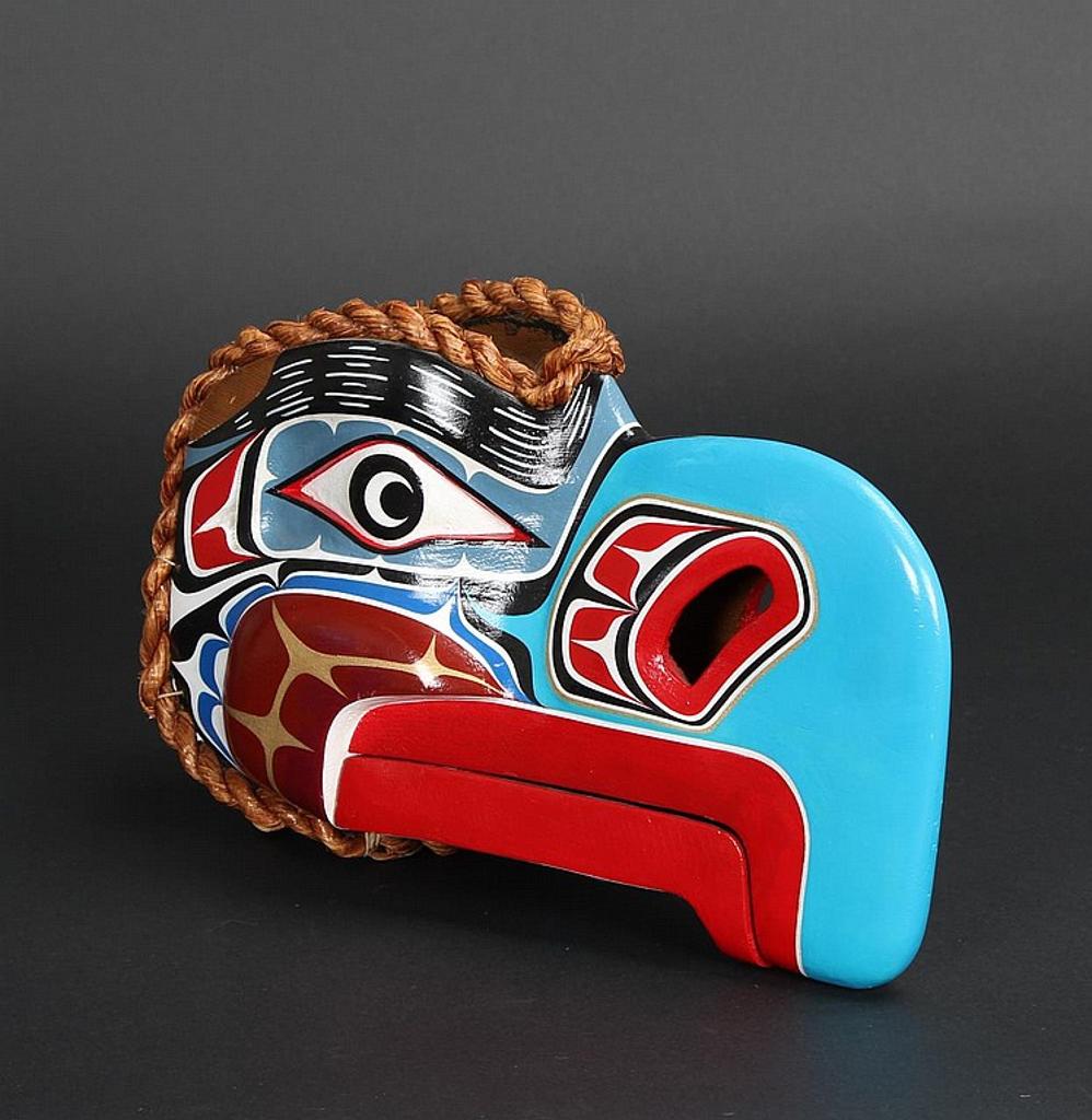 John Jacobsen (1883-1953) - a carved and polychromed red cedar Eagle head mask