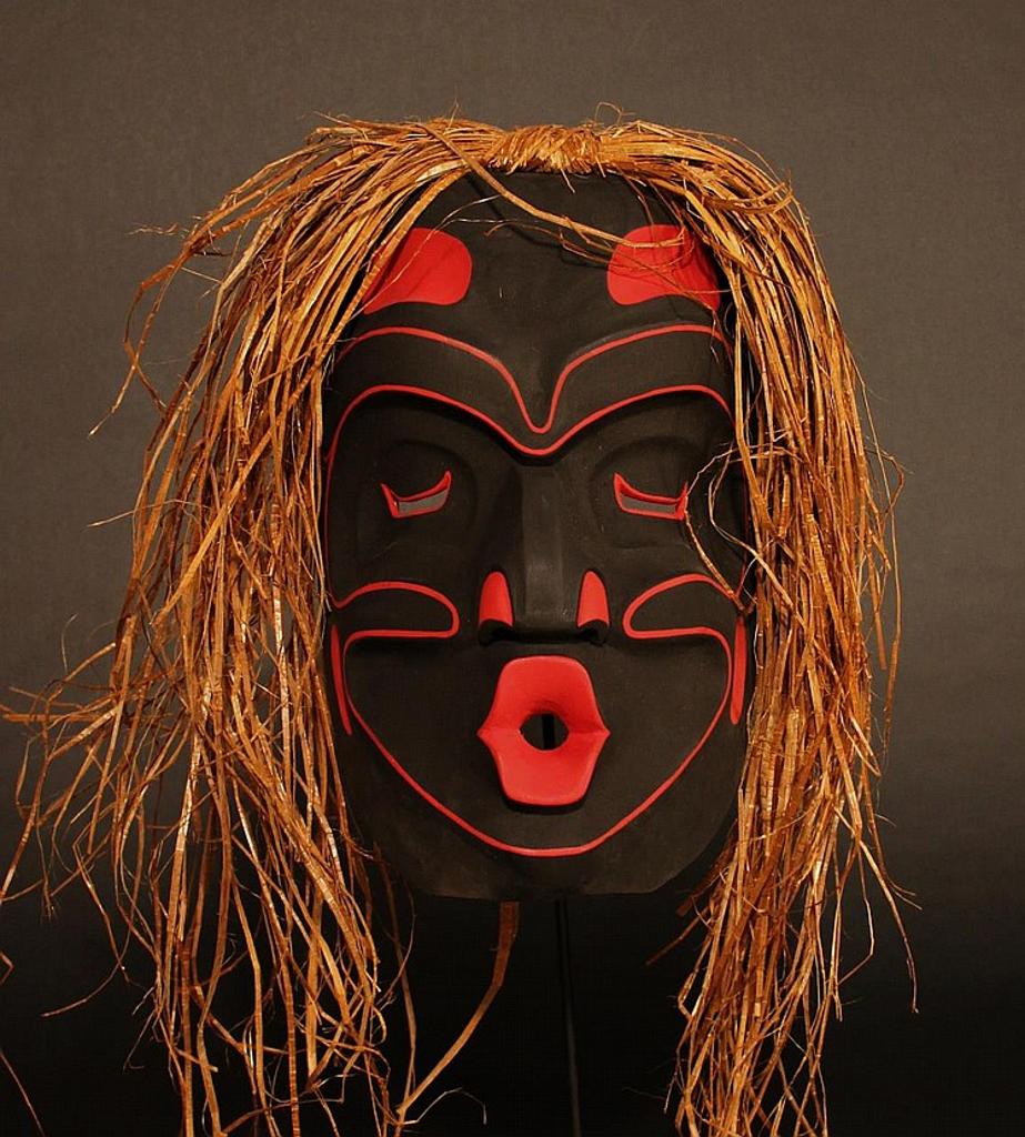 Emile Kavistep Thibert - a carved and polychromed Dzonokwa with cedar strip hair