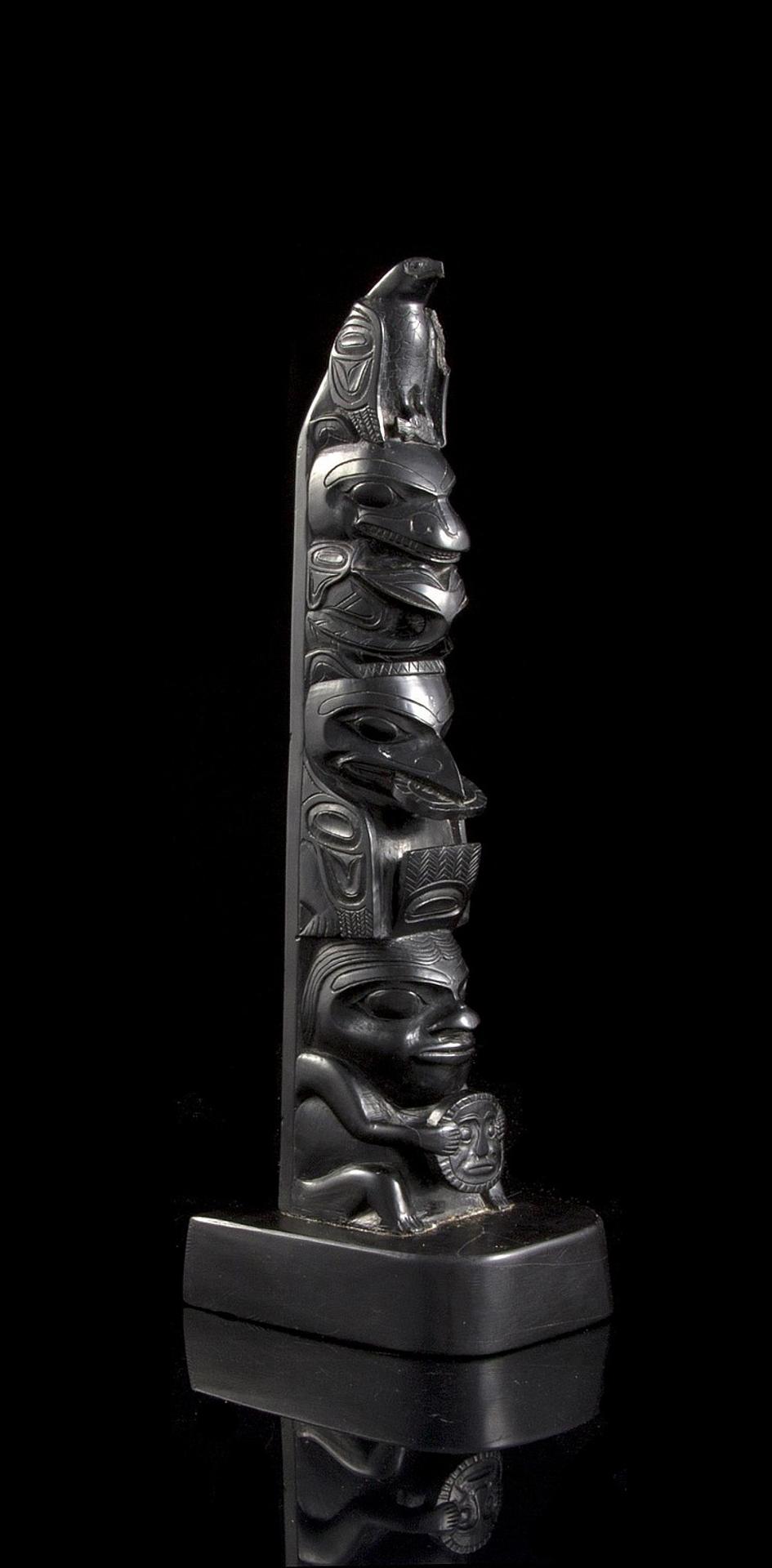 Rufus Moody (1923-1998) - an argillite pole depicting Eagle