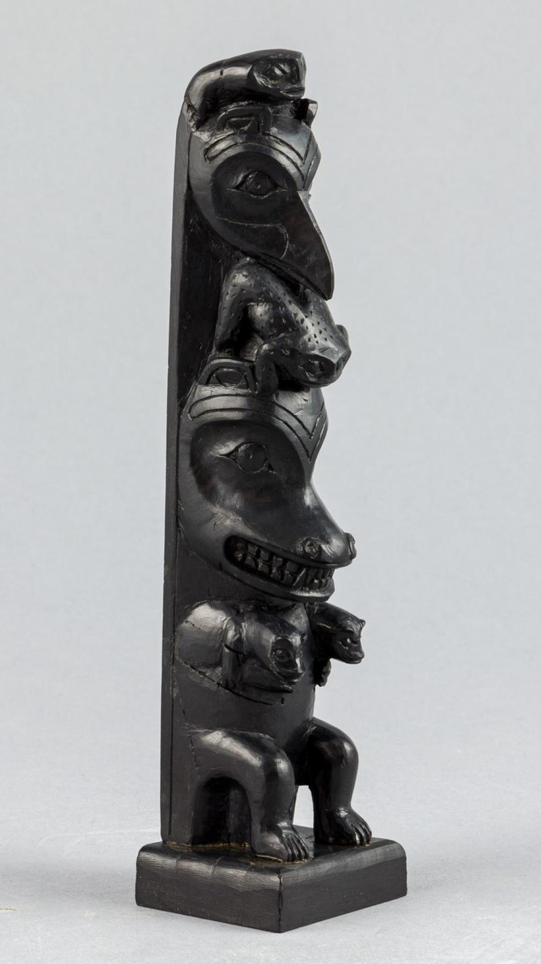 Robert Charles Davidson (1923) - a carved argillite pole depicting Frog