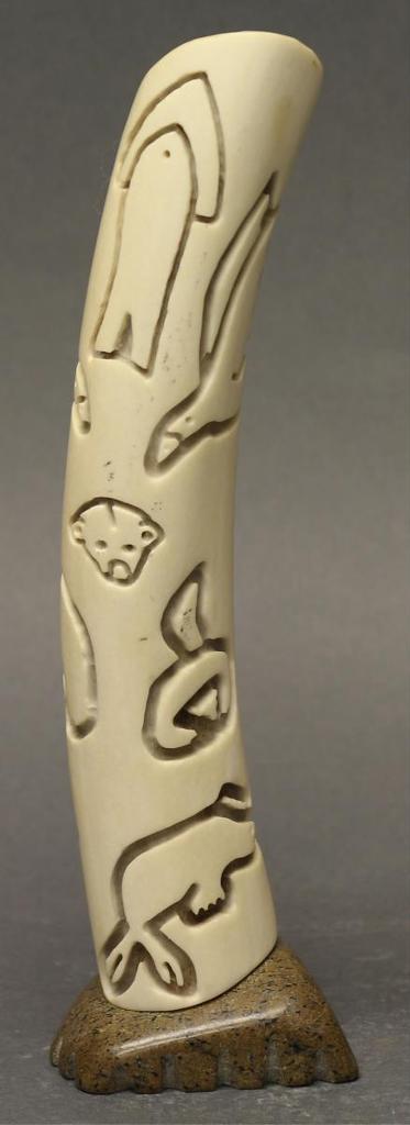 Tommy Nakoolak (Coal - -caribou antler on stone base