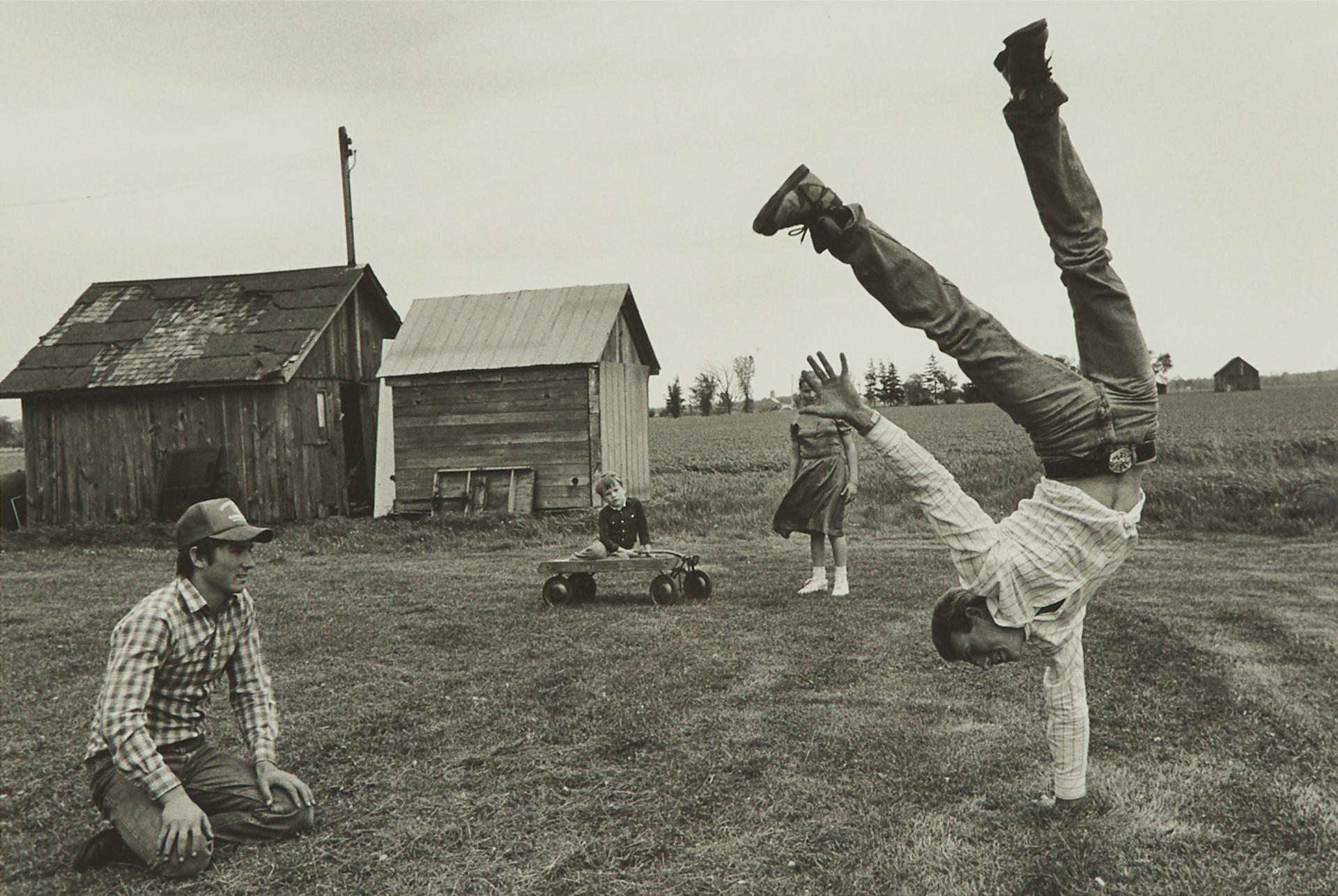 Larry Towell - Lambton County, Ontario, Canada (Handstand), 1995