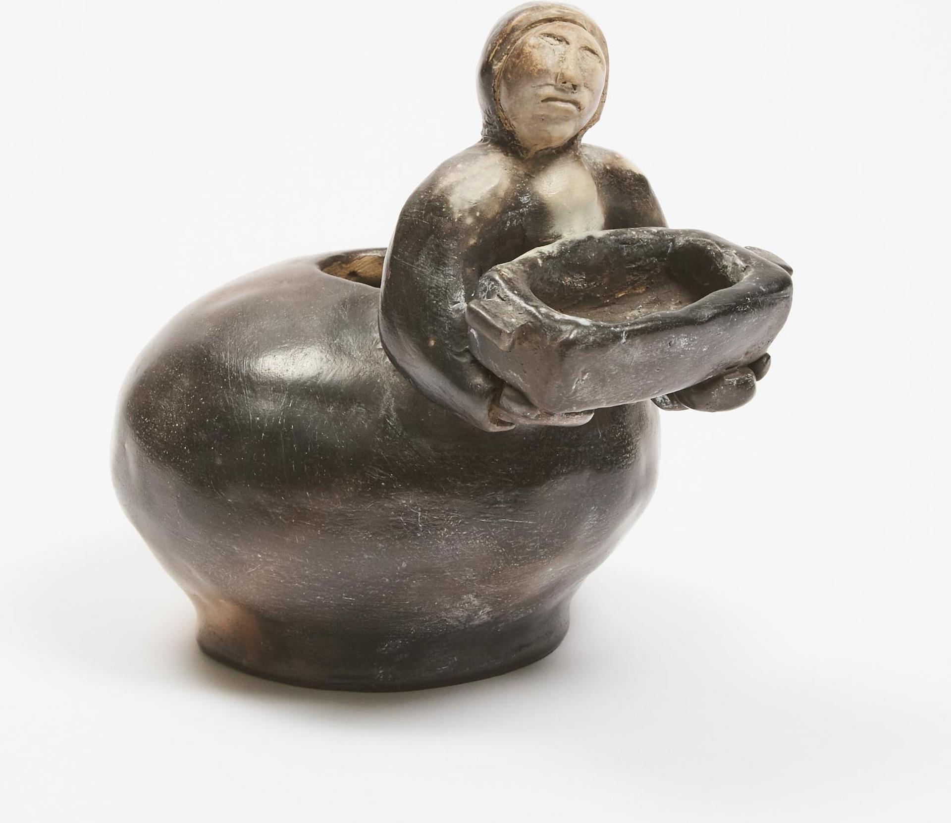 Pierre Aupilarduk (1961) - Woman Holding Qulliq