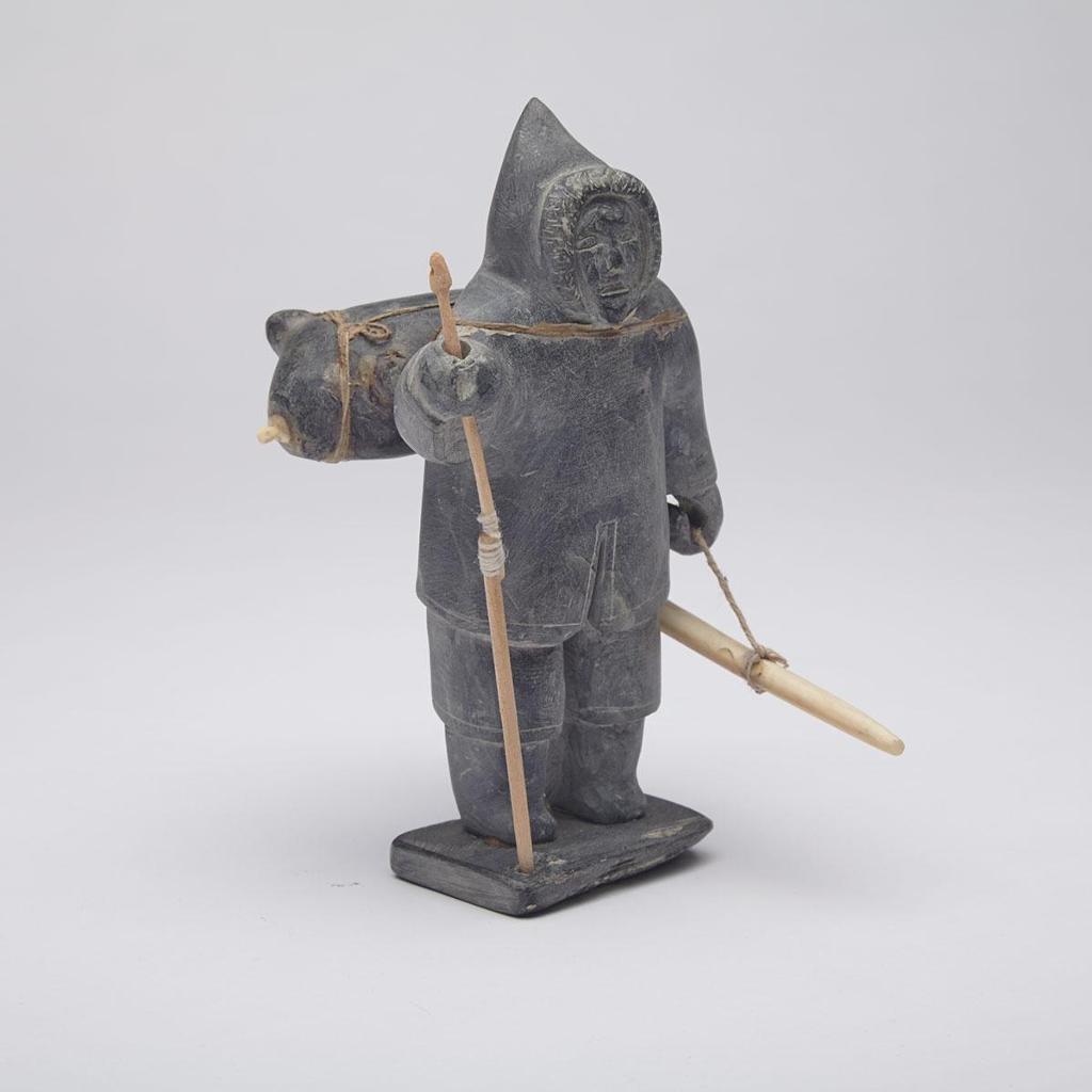 Ennutsiak (1896-1967) - Hunter Carrying Avataq