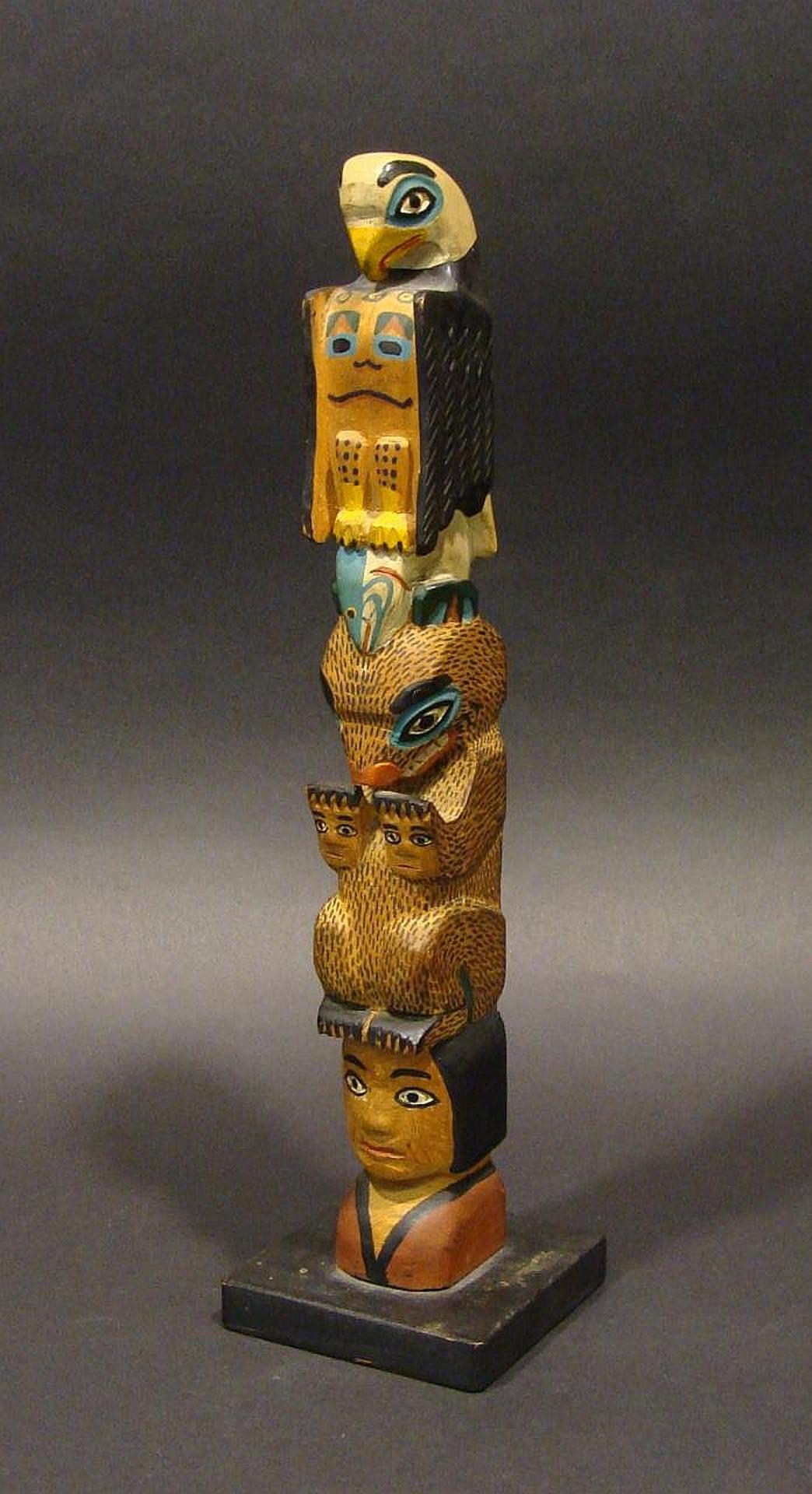 Eli Tait - a carved and polychromed cedar model pole depicting Eagle
