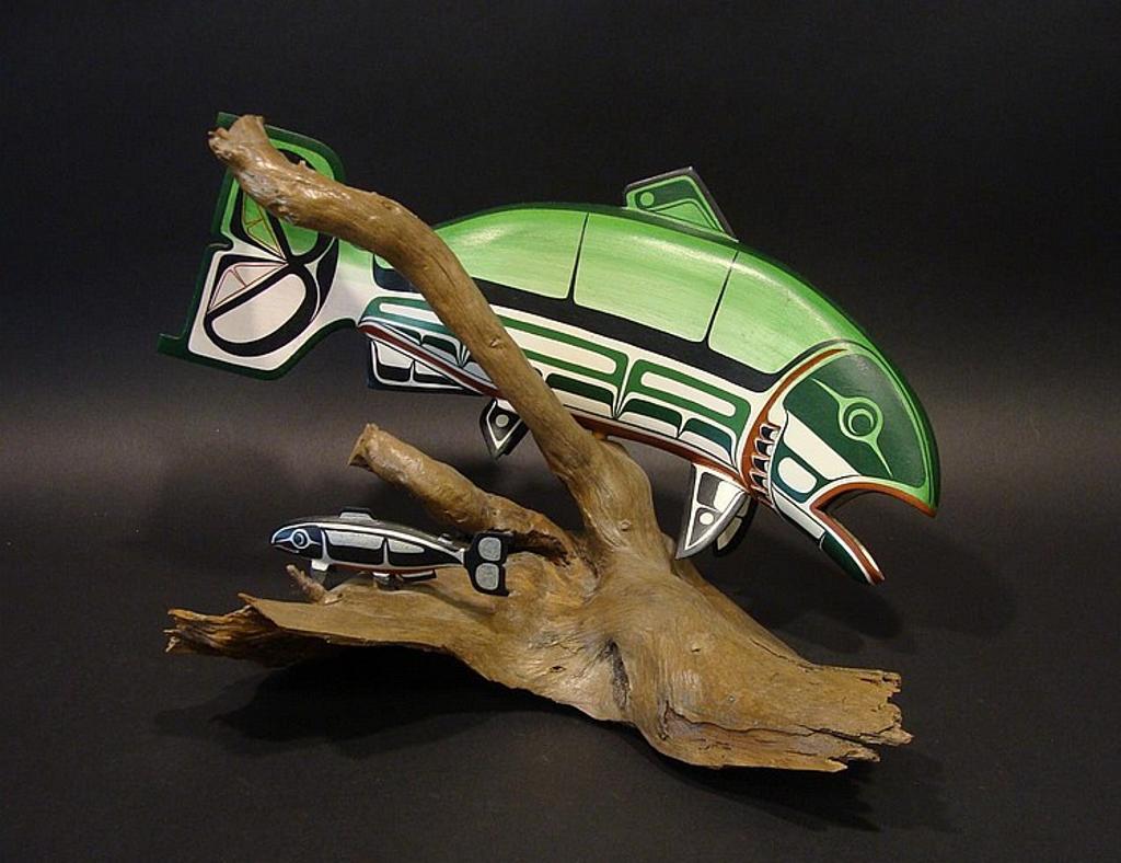 Harris Smith (1942-2005) - a polychromed wood carving of a salmon chasing a grilse