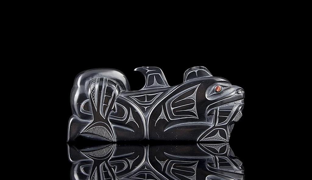 Glen Pollard (1957) - carved argillite figure depicting Haida Wasgo and Salmon