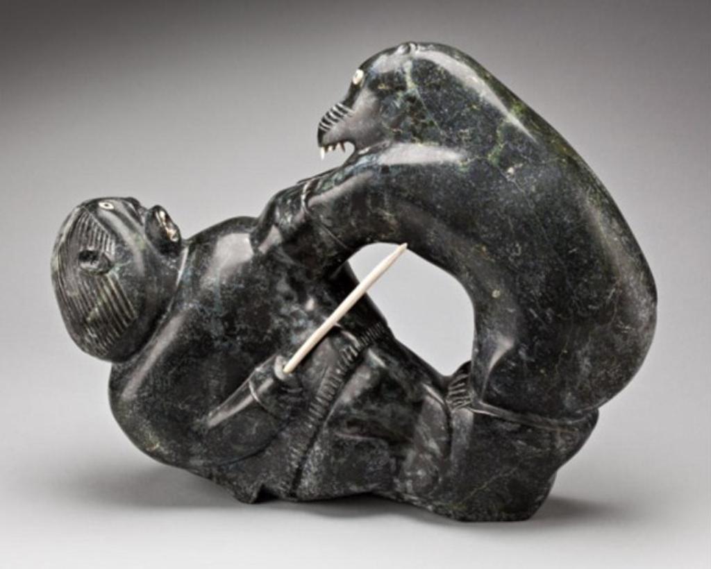 Judas Ullulaq (1937-1998) - Mottled black stone and ivory,