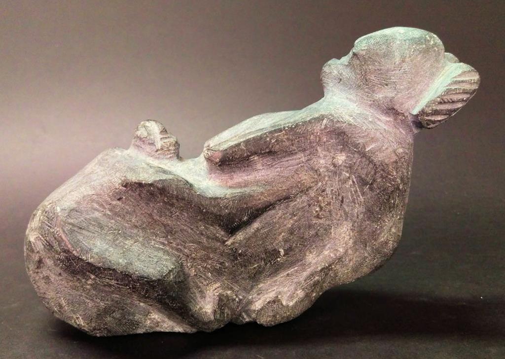 Elizabeth Nutaraaluk Aulatjut (1914-2002) - c. 1985, Mother & child,  Stone, 5.75 x 3.25 x 8.5 in. 14.6 x 8.3 x 21.6 cm. S-292