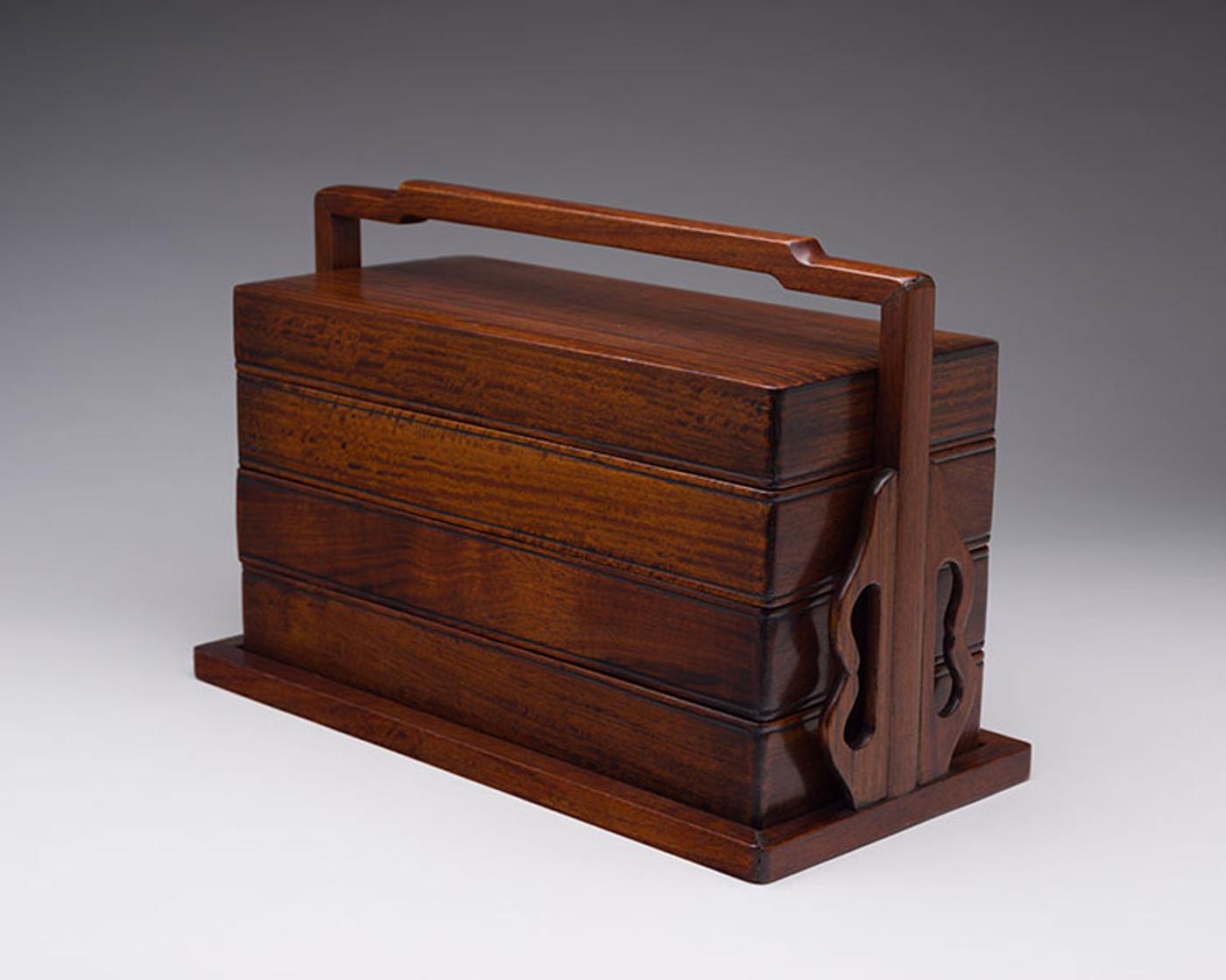 Chinese Art - A Chinese Huanghuali Three-Tiered Picnic Box, 19th Century