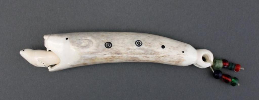 Brian Kulik (1976) - Needlecase in the form of a bear capturing a seal, ca. mid-late 1990s, bone, glass beads, sinew and colour, with an ivory stopper and two ivory needles 1.375 x 8.5 x 1.125 in, 3.5 x 21.6 x 2.9 cm