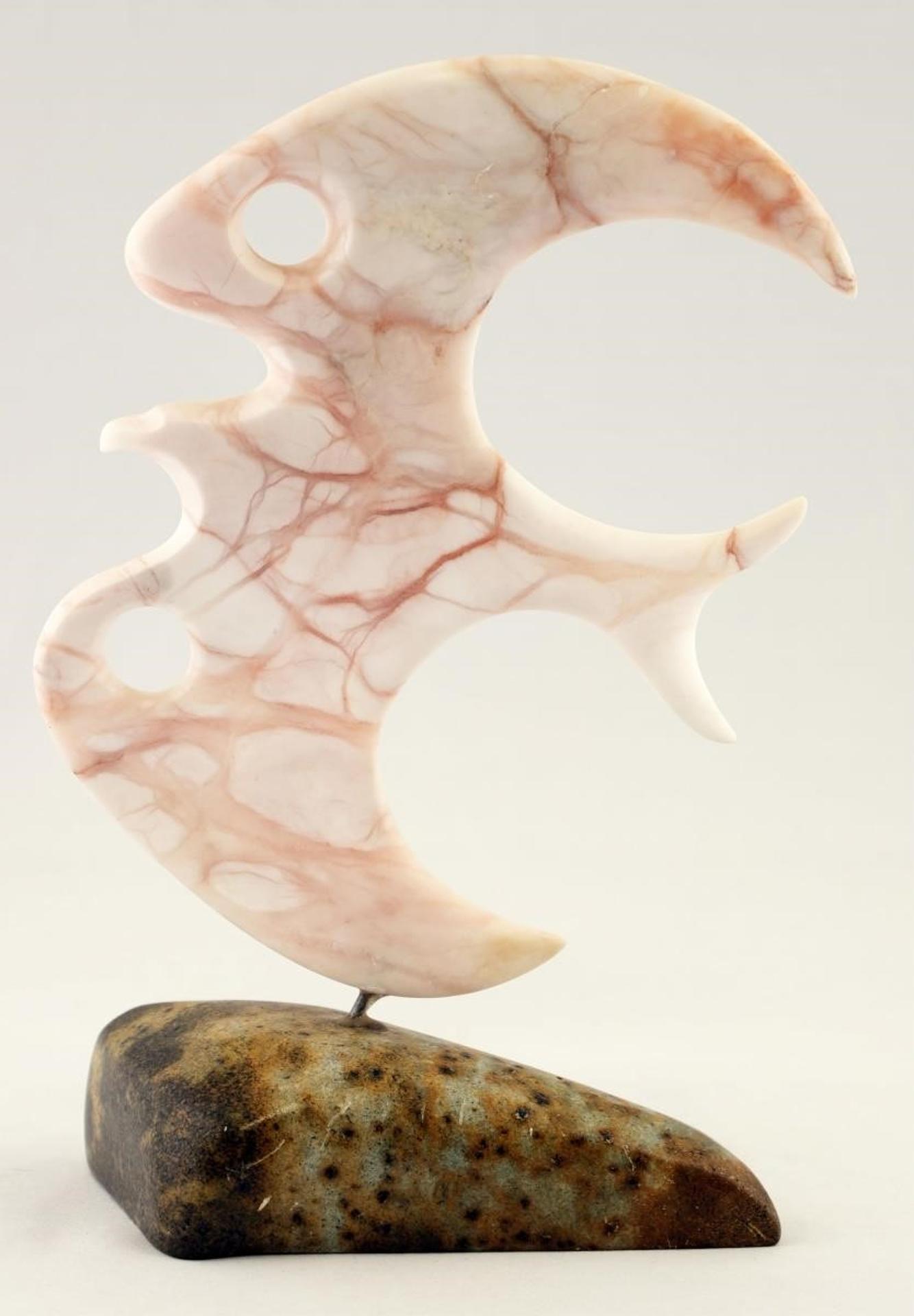 Dolphus Cadieux (1954) - a mixed stone carving of a bird in flight