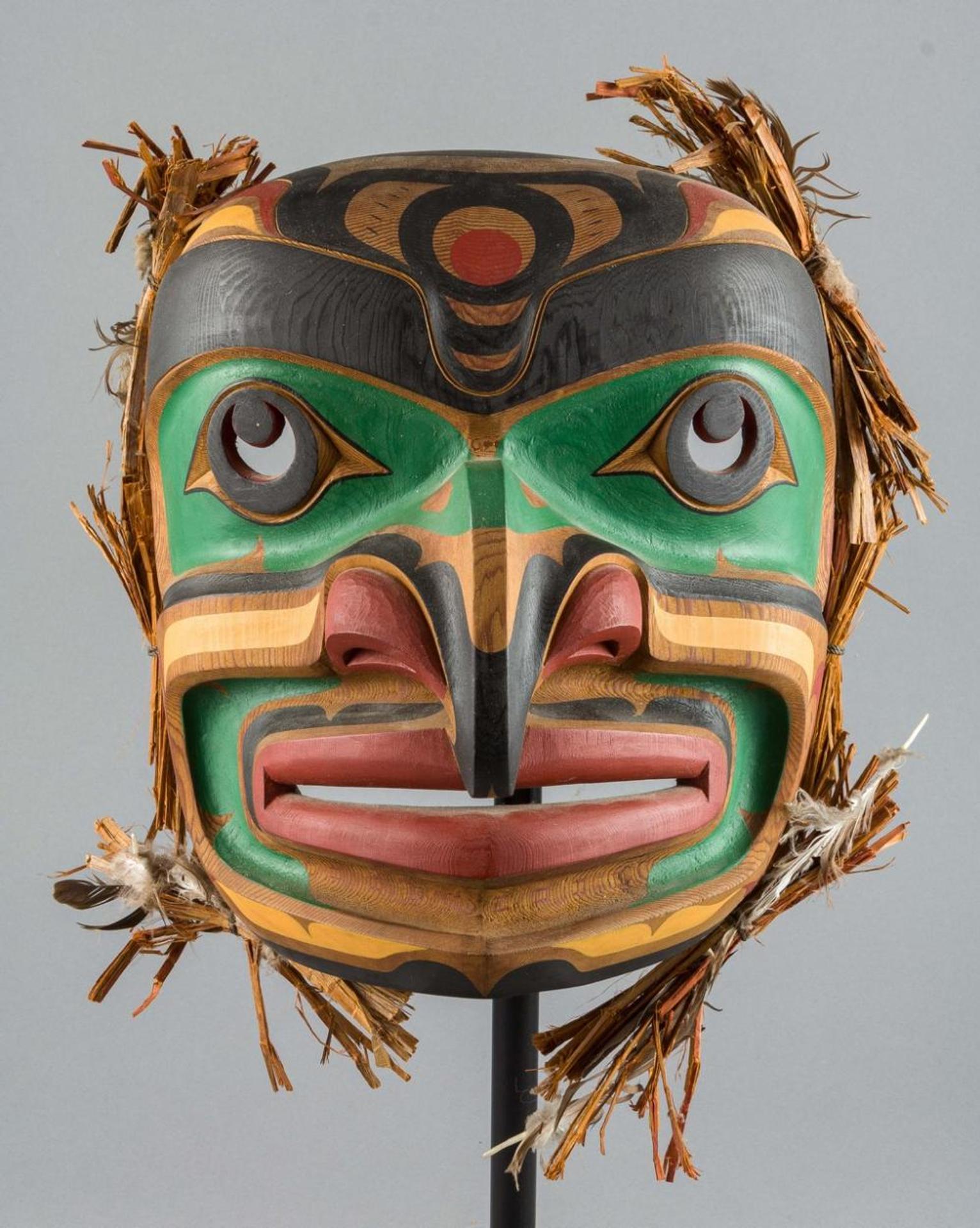 Tom Hunt (1964) - a carved and polychromed red cedar Kwakiutl Hawk man mask