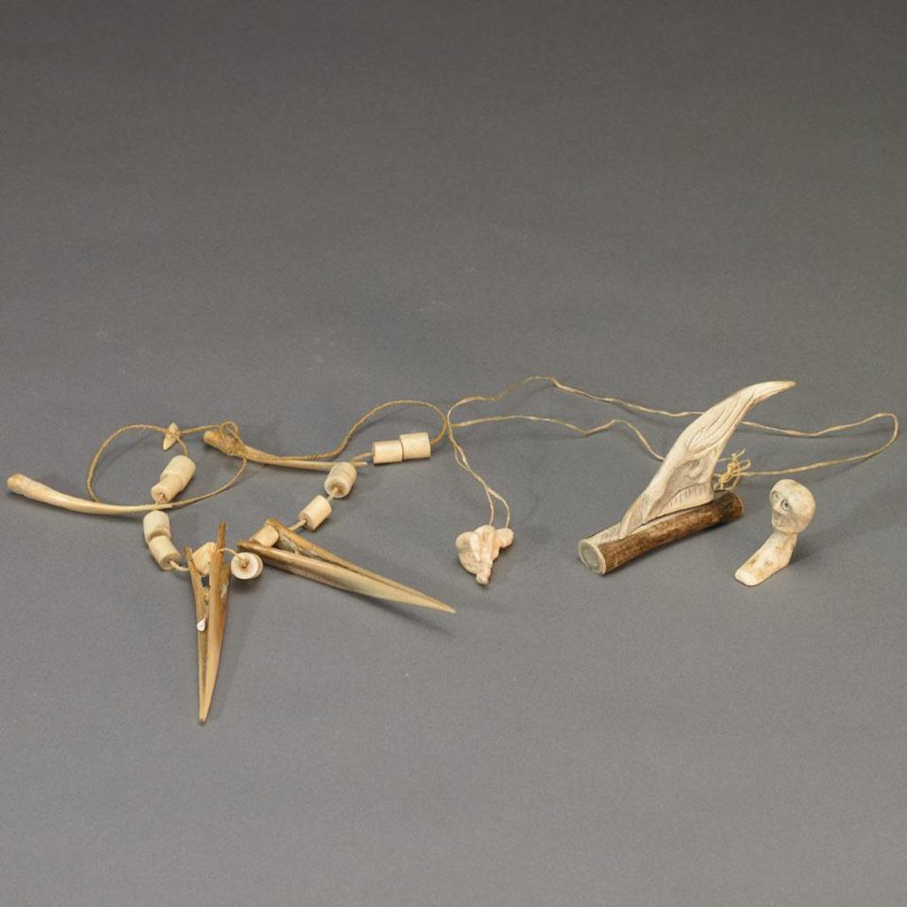 Etervutag - Two Necklaces, Bird Carving And A Skull Figure