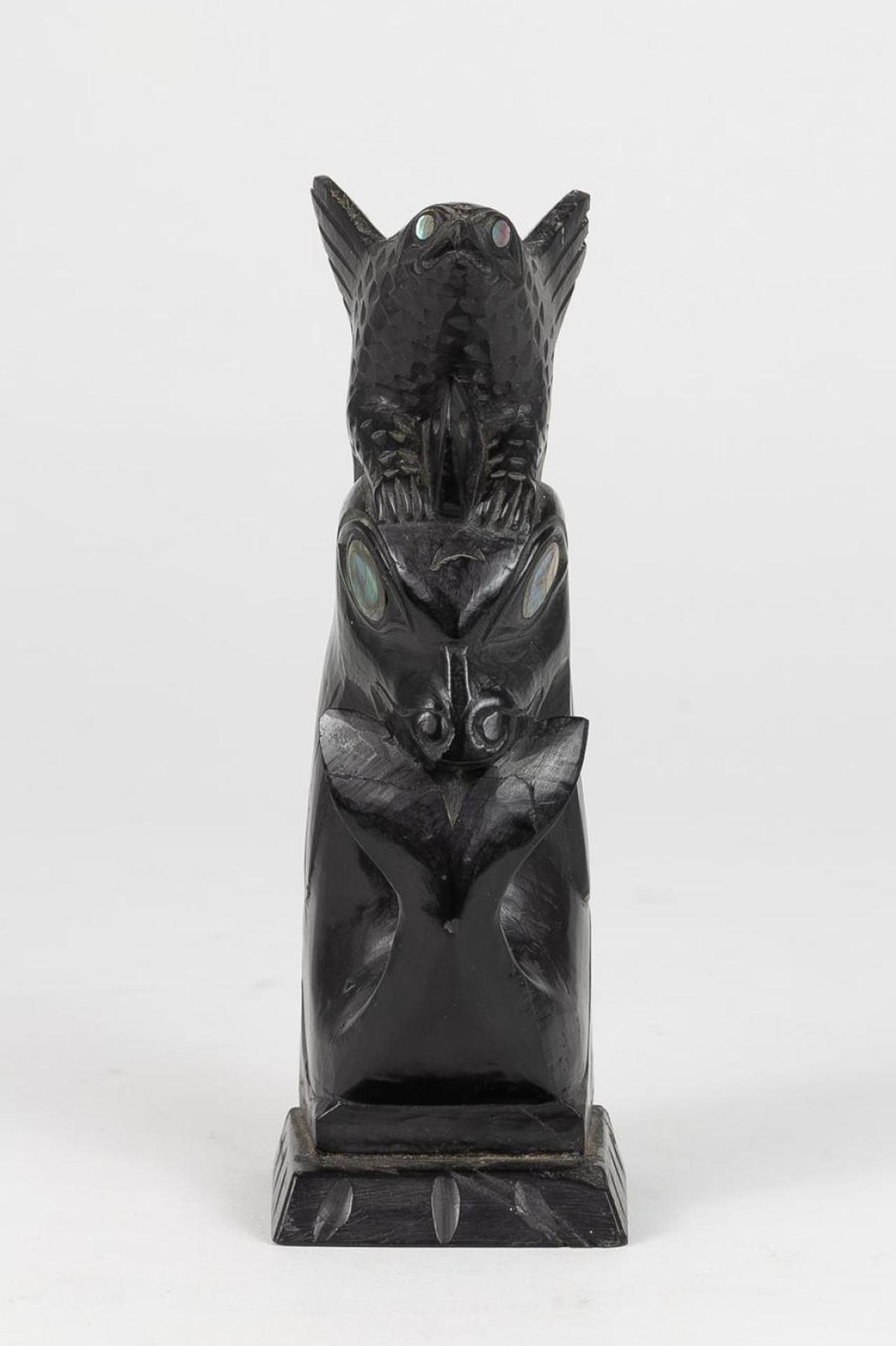 Captain Andrew Brown (1879-1962) - a carved argillite totem pole depicting Eagle above Killer Whale