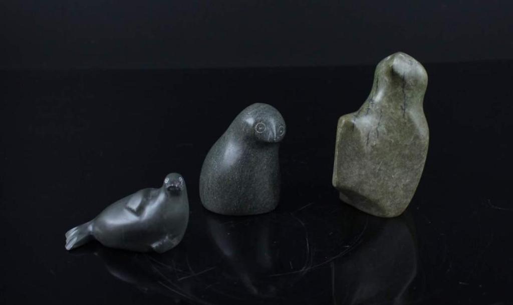 Paopa - a green stone carving of a bird