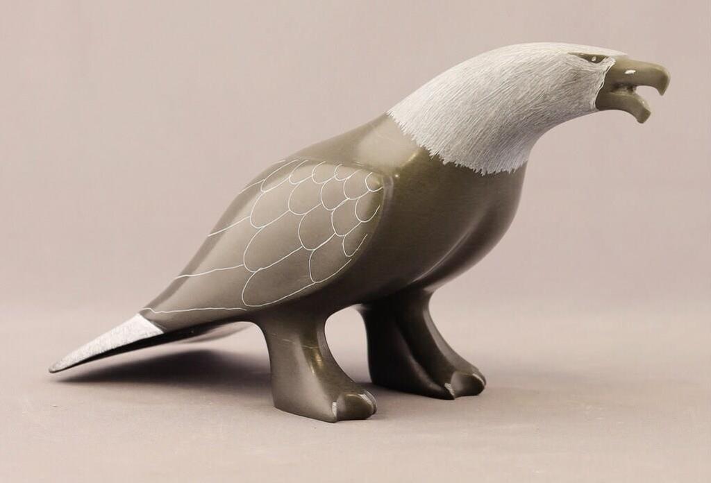 Josie Ohaytook (1952) - a grey stone carving of an Eagle
