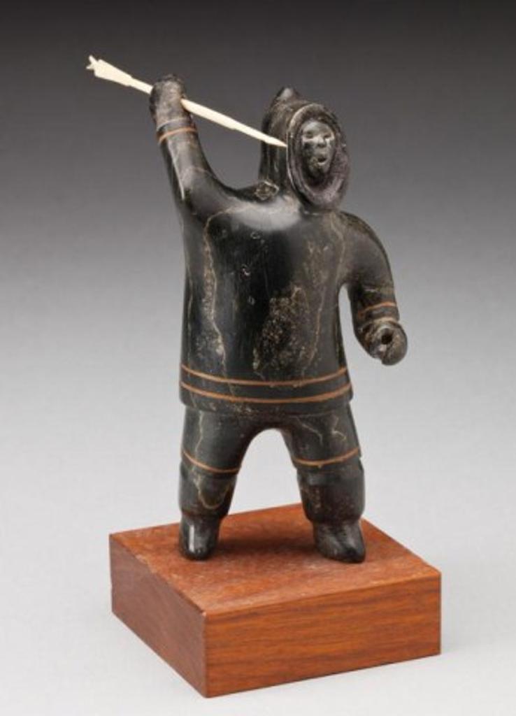 Akeeaktashuk (1898-1954) - Harpoon hunter, ca. 1950-53, marbled green-black stone, ivory and inlay, 5.625 x 2.625 x 3 in, 14.3 x 6.7 x 7.6 cm