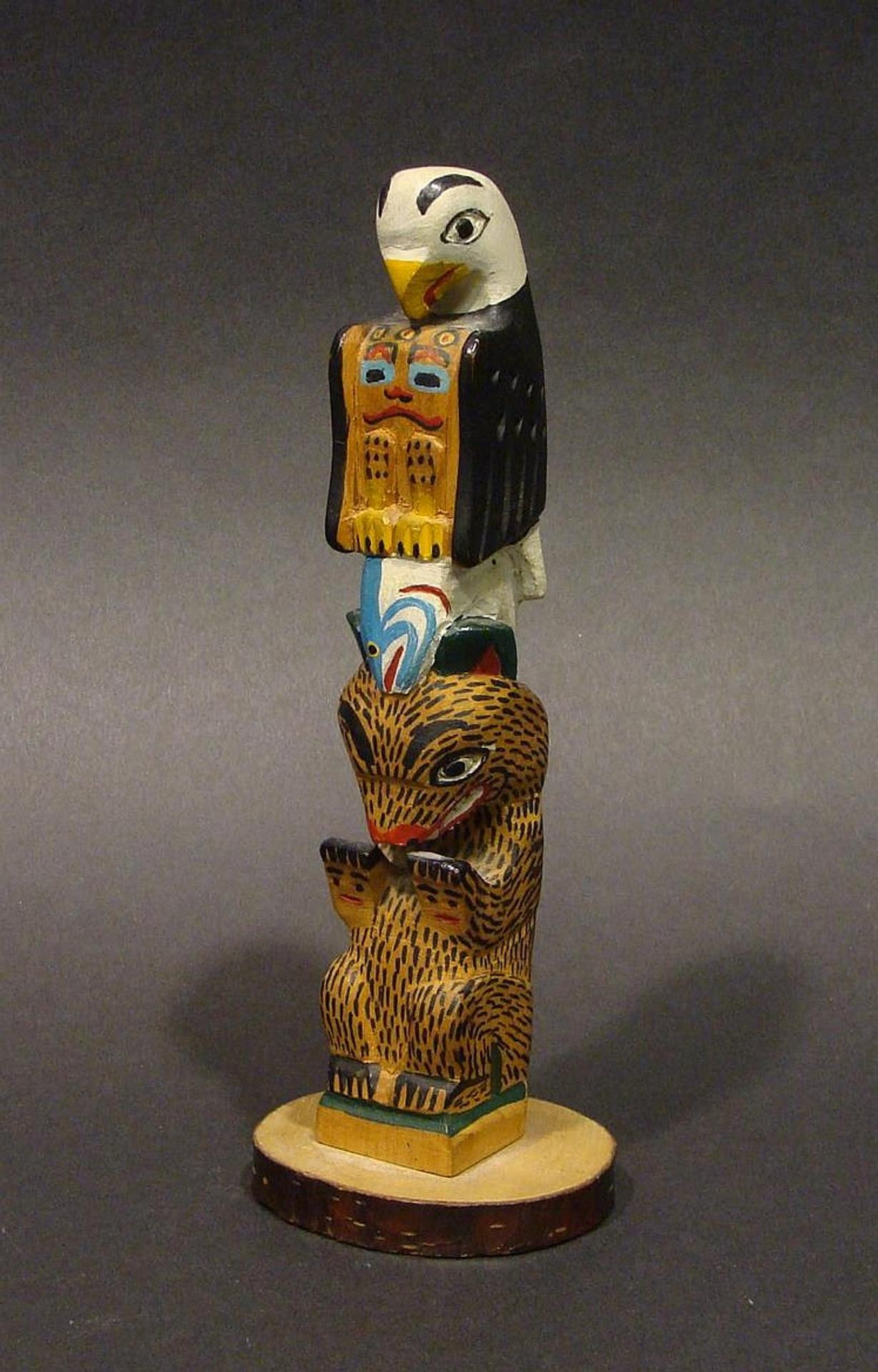 Eli Tait - a small carved and polychromed cedar figure pole depicting Eagle