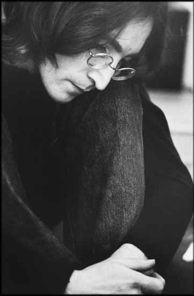 Ethan Russell (1945) - John Lennon Listening to the 
