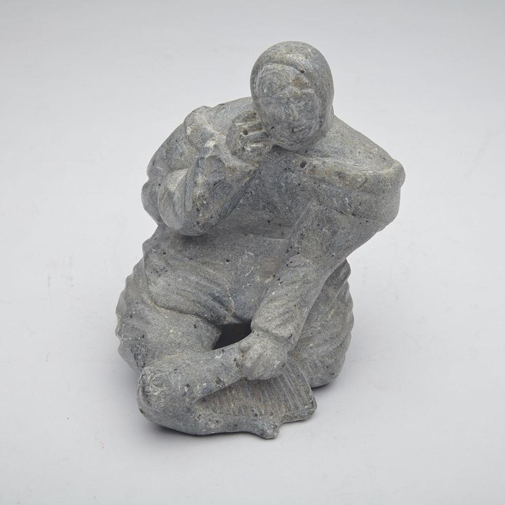 Eva Atammik Keatainaq (1919-1988) - Woman Flensing A Seal