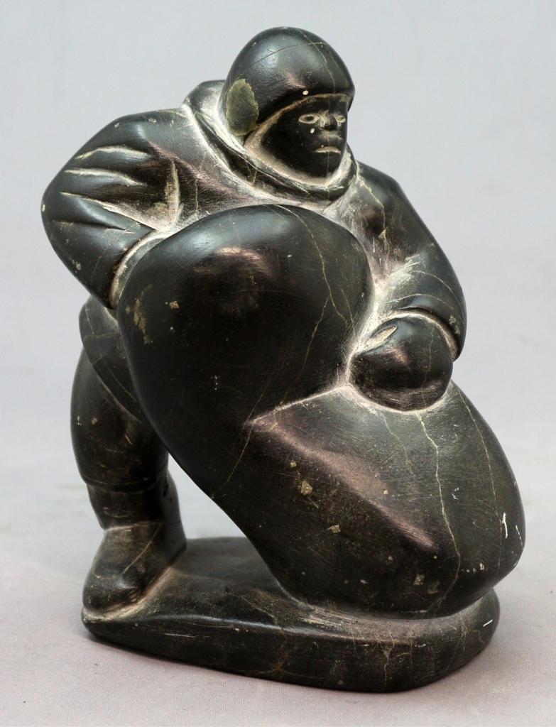 Allie Kanayuk (1941) - Man Filling Seal Bladder