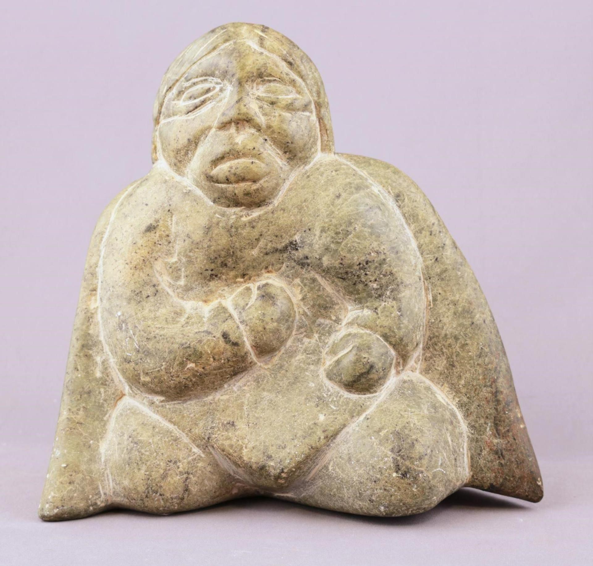 Thomas Sivuraq (1941-1991) - a mottled green stone carving of a Kneeling Man