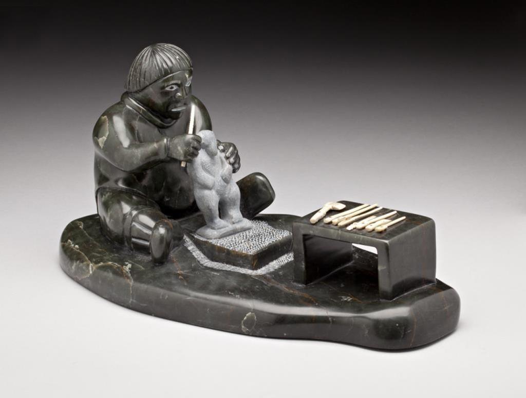 Jobie Echalook (1970) - Artist Carving a Bear