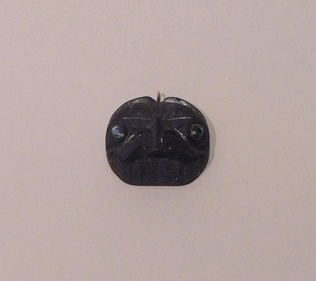 Earl James - a carved argillite eagle pendant