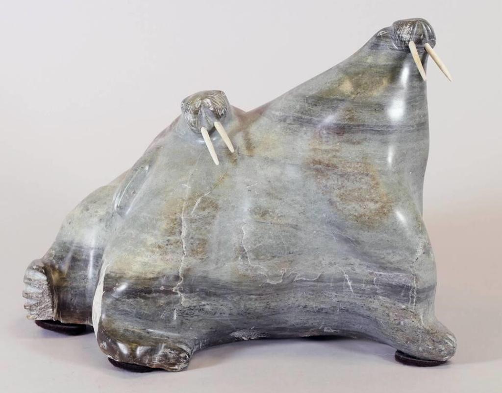 Davidee Kavik (1915) - a mottled grey stone carving of Two Walrus with bone tusks, with Igloo card
