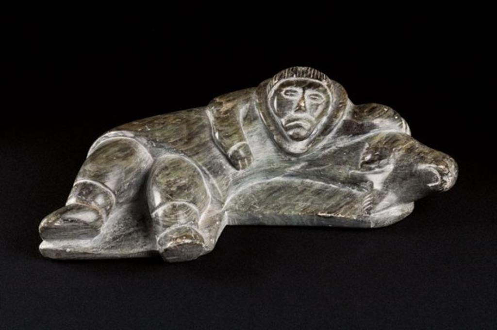 Ningiuq Kiatainaq (1918) - Hunter resting against a captured seal