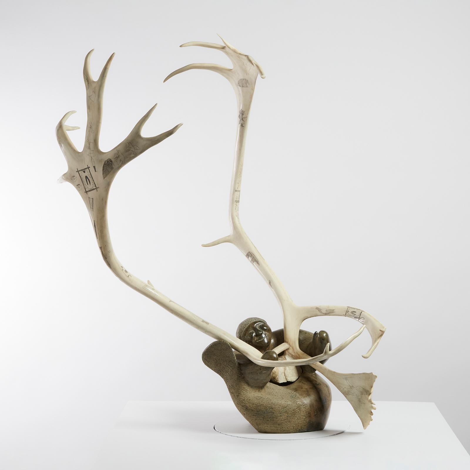 Elijah Michael (1929-2008) - Sedna Holding Etched Caribou Antlers