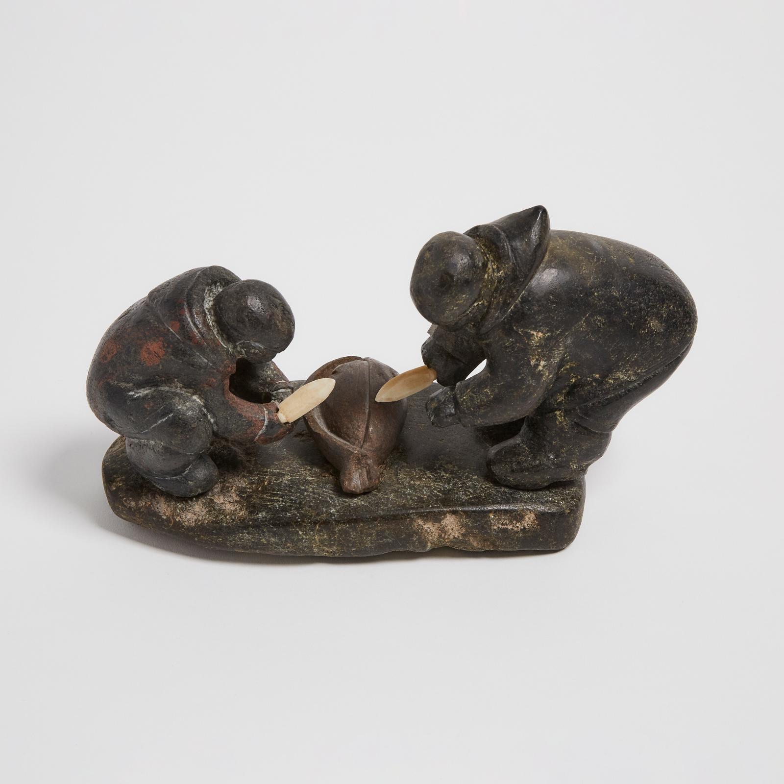 Ennutsiak (1896-1967) - Two Hunters Butchering A Seal
