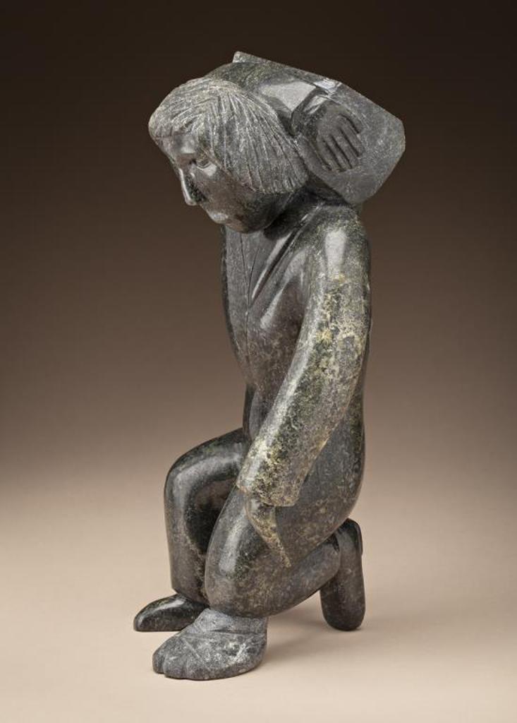 Oviloo Tunnillie (1949-2014) - Carrying a Carving Stone, 2001