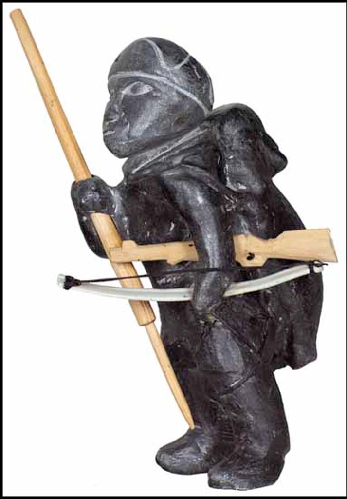 Joe Talirunili (1893-1976) - Hunter Carrying a Seal with Harpoon, Bow and Rifle