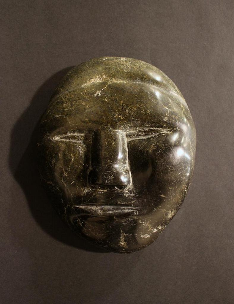 Evaluardjuk - a carved soapstone wall plaque in the form of a face