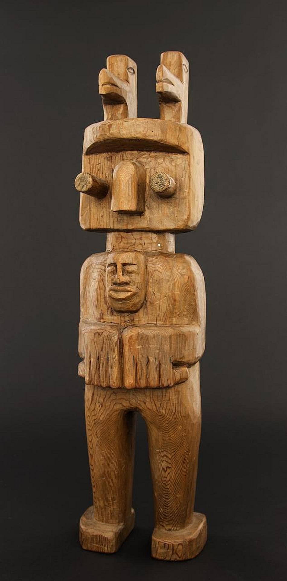 Alex Julian - a carved red cedar Salish figure