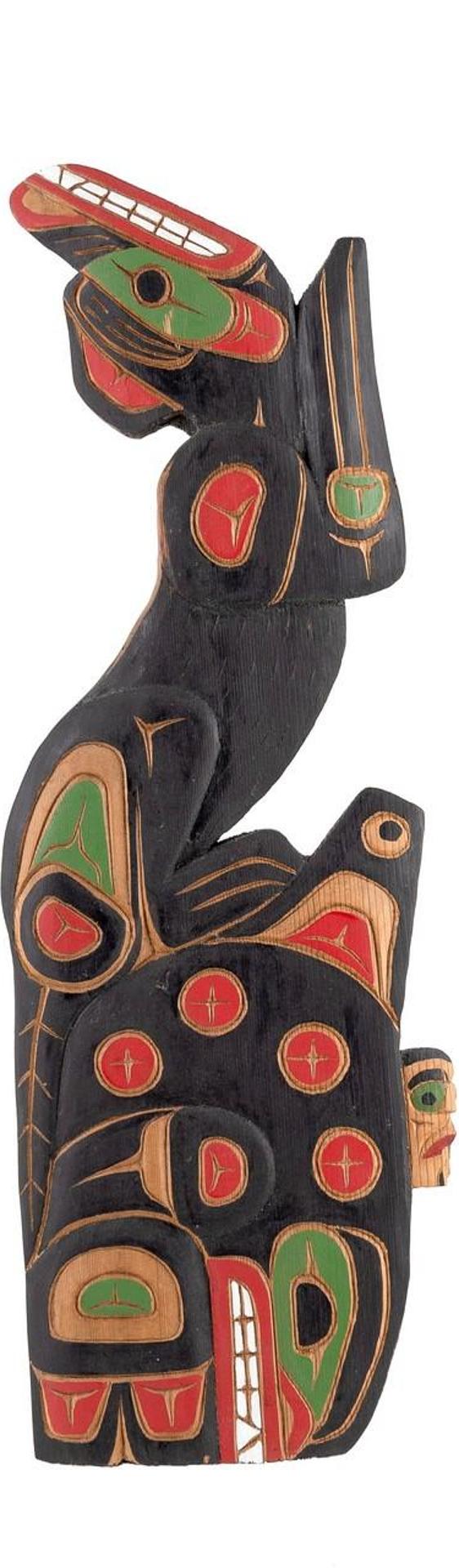 Sean Moody - a carved and polychromed cedar plaque depicting Wolf and Killer Whale