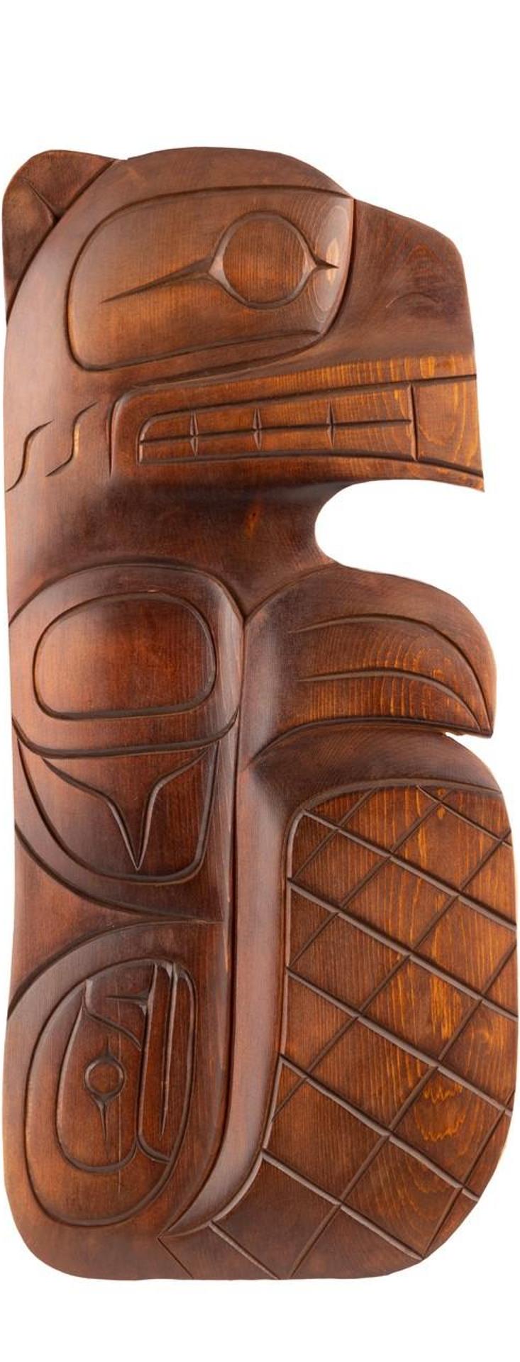 Doran Lewis - a carved and stained cedar plaque depicting Beaver
