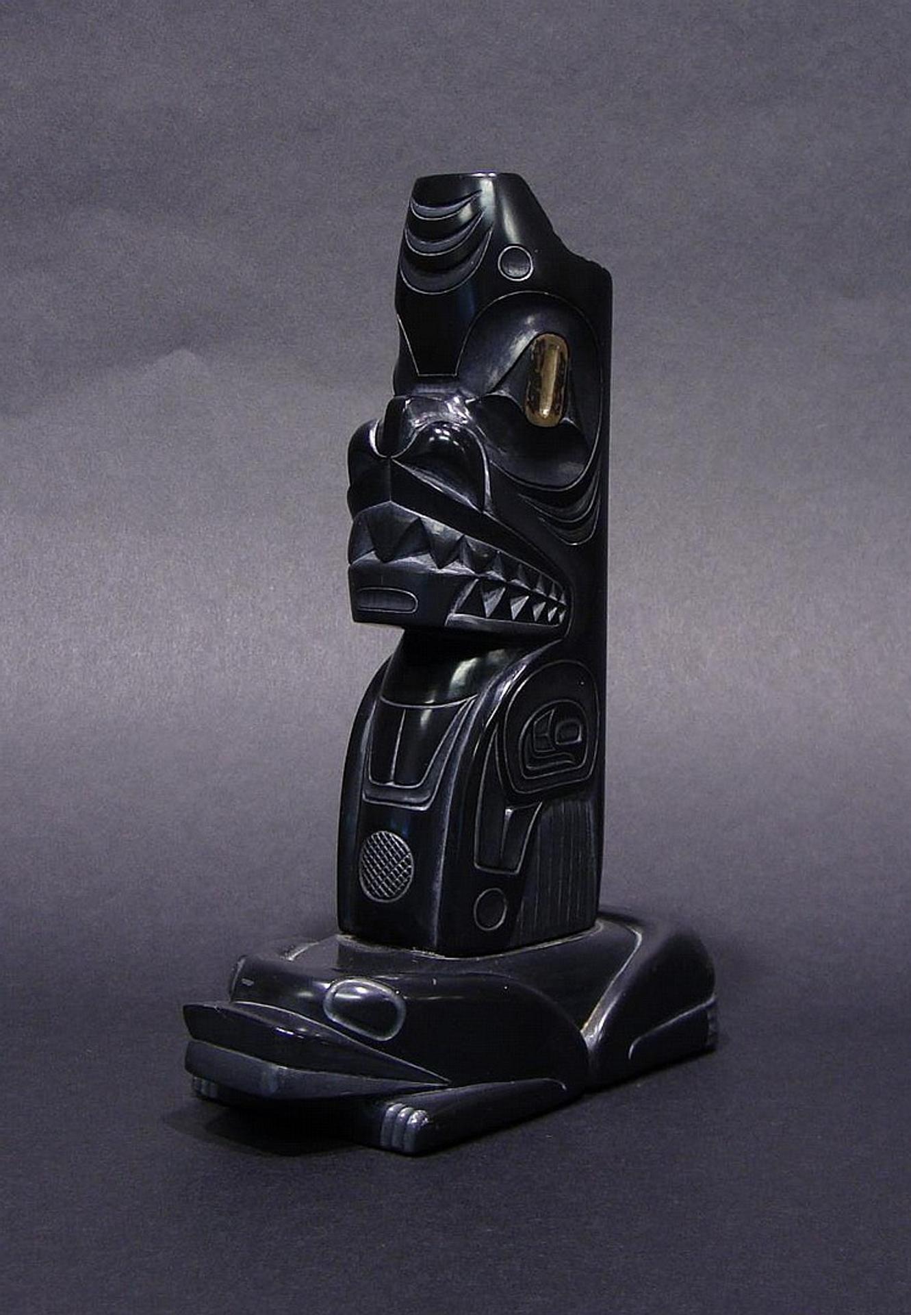 Glen Pollard (1957) - an argillite pole depicting Shark and Frog