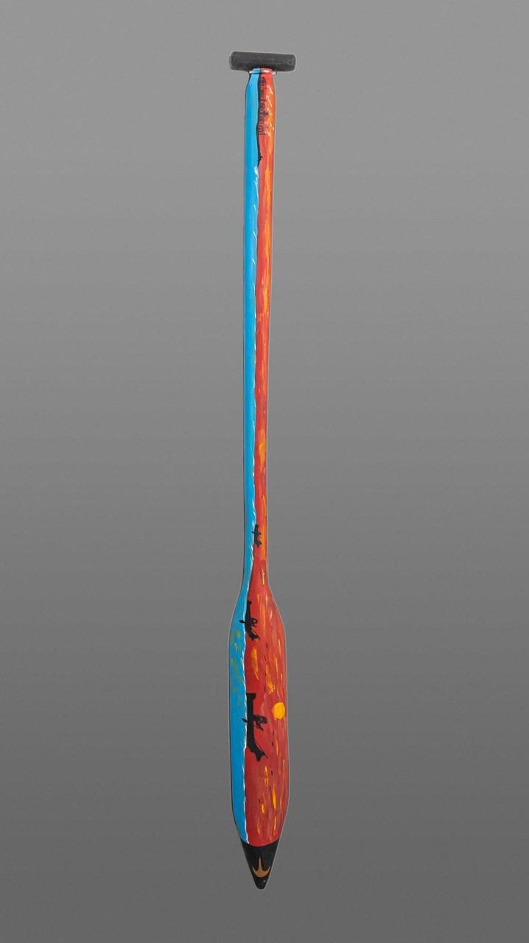 E. Amos - a carved and painted paddle
