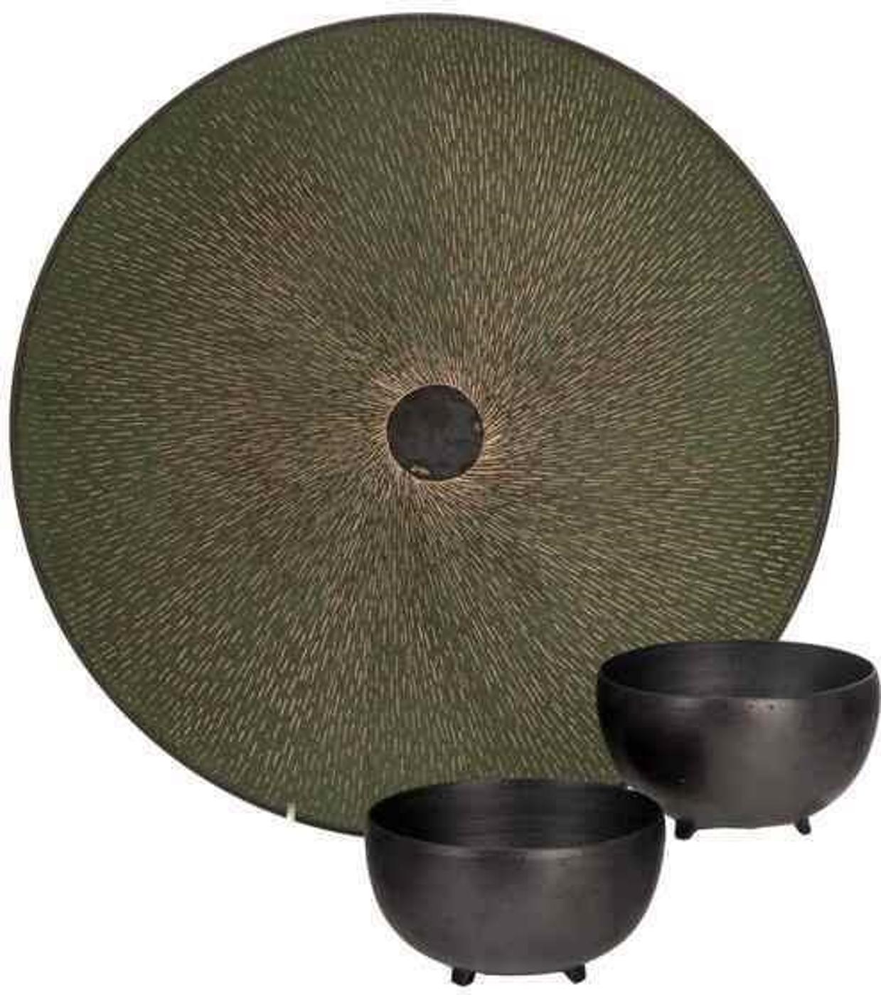Christiane Wilhelm (1954) - Trio of black and green stoneware bowls with textured patterns in the interior