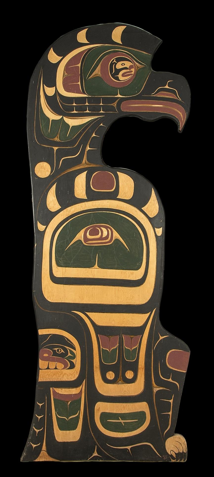 Joe Campbell - a carved and polychromed cedar plaque in the form of an eagle