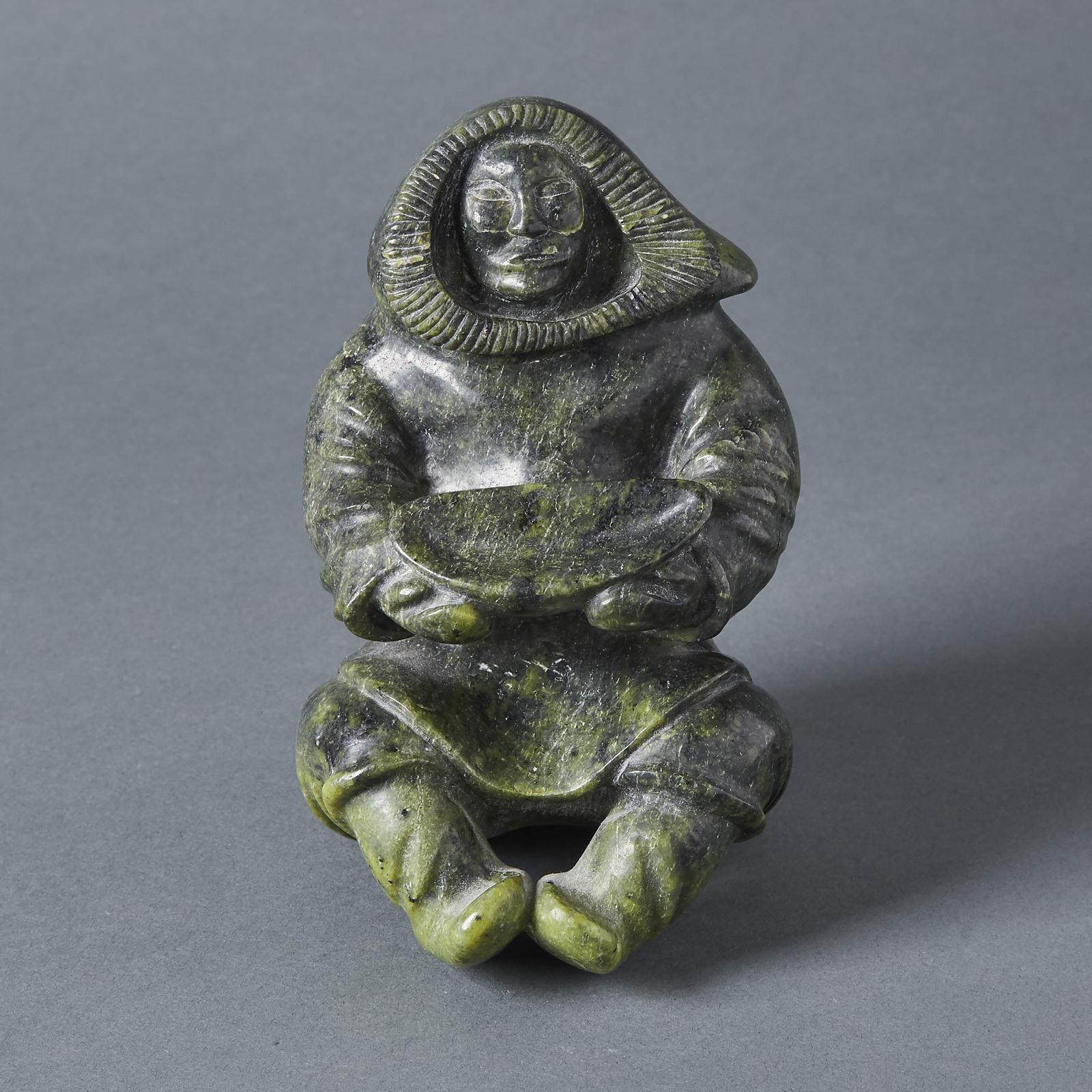 Nuveeya Ipellie (1920-2010) - Seated Woman Holding A Qulliq
